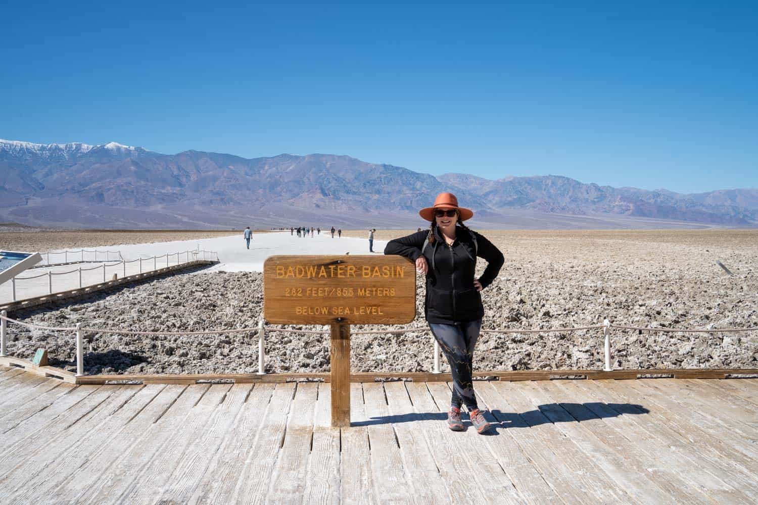 Amanda with Badwater Basin sign in Death Valley