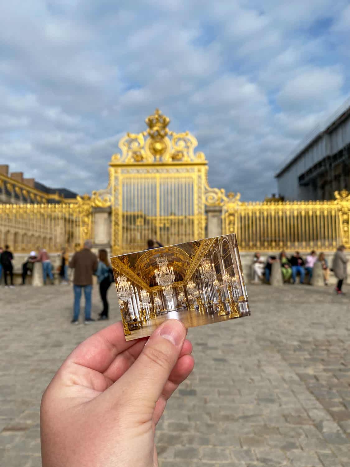 Versailles entrance ticket in front of the Palace of Versailles entrance