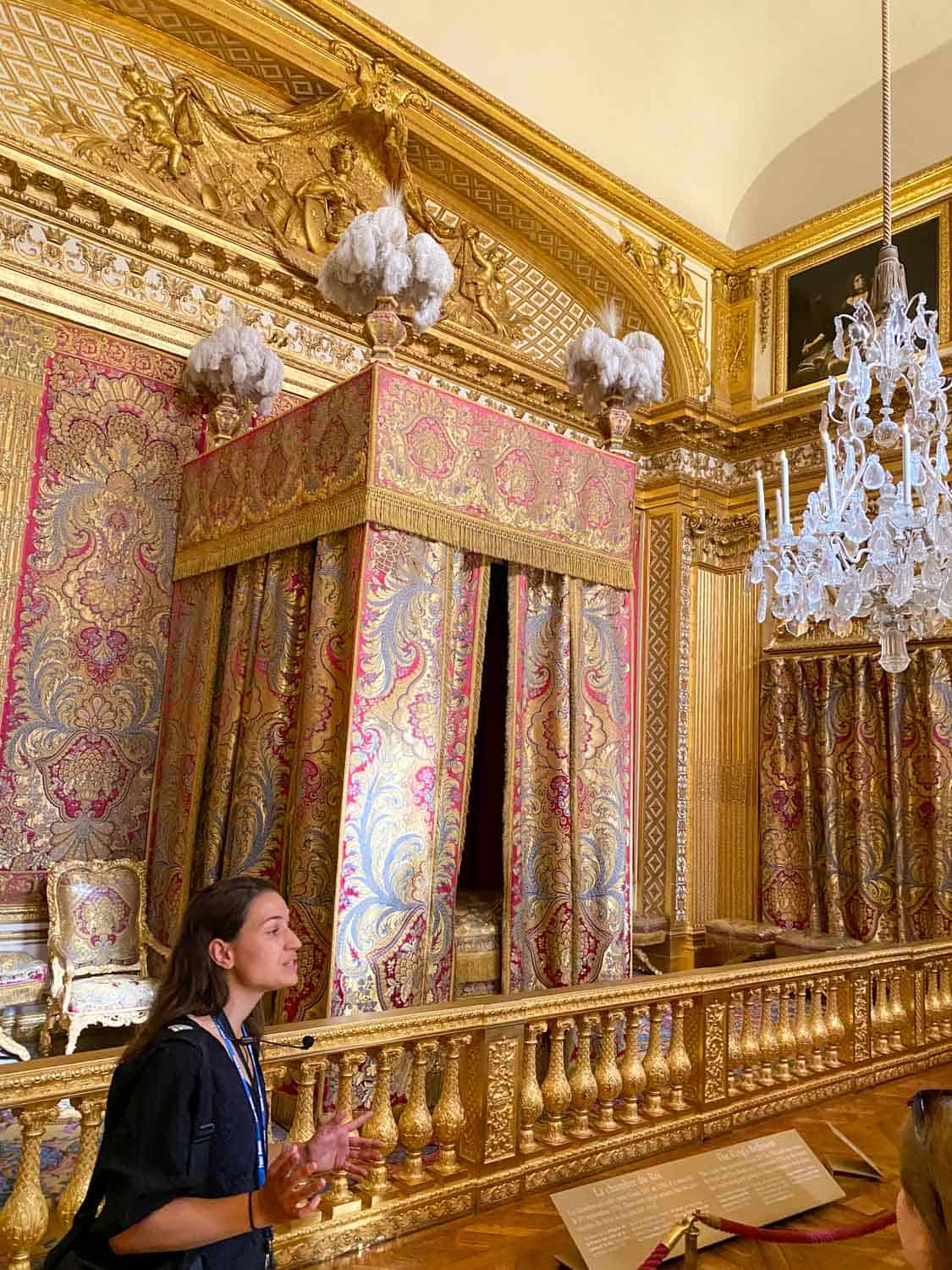 Versailles guide in King Louis bedroom